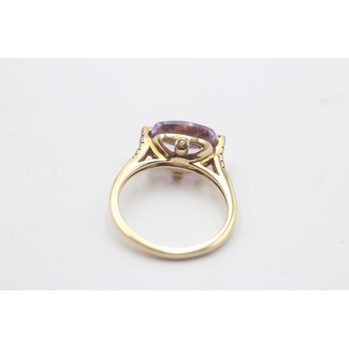 1137 - A 9ct gold diamond and yellow sapphire accented amethyst cocktail ring, size N½ - approx. gross weig... 