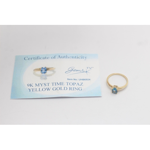 1138 - A 9ct gold blue topaz set solitaire ring - approx. gross weight 1.7 grams