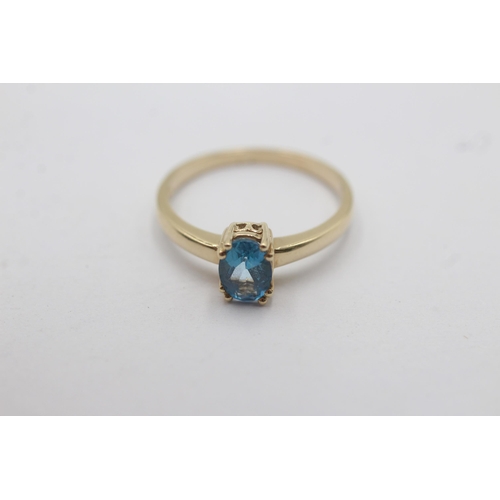 1138 - A 9ct gold blue topaz set solitaire ring - approx. gross weight 1.7 grams