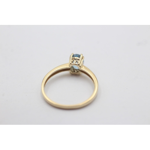 1138 - A 9ct gold blue topaz set solitaire ring - approx. gross weight 1.7 grams