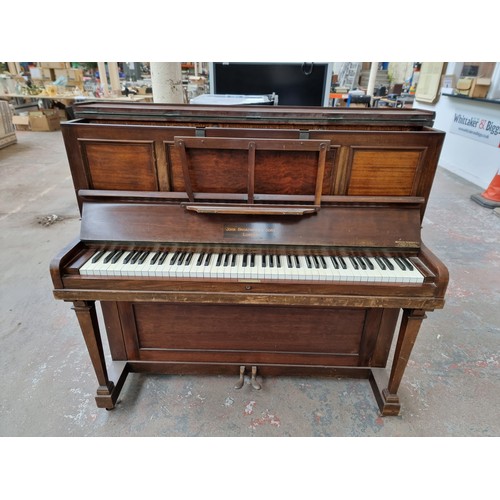 821A - An early 20th century mahogany John Broadwood & Sons upright piano