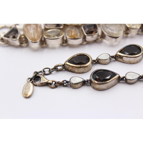 1153 - Two .925 silver gemstone set bracelets