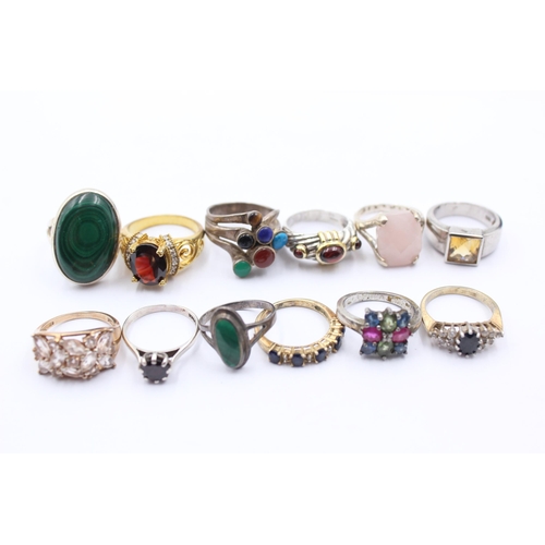 1154 - Twelve .925 silver gemstone set rings