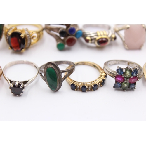 1154 - Twelve .925 silver gemstone set rings