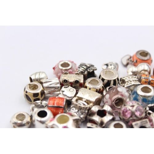 1158 - A large collection of .925 silver branded charms