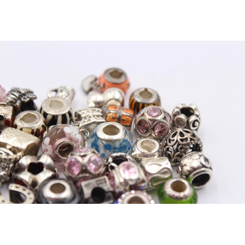 1158 - A large collection of .925 silver branded charms