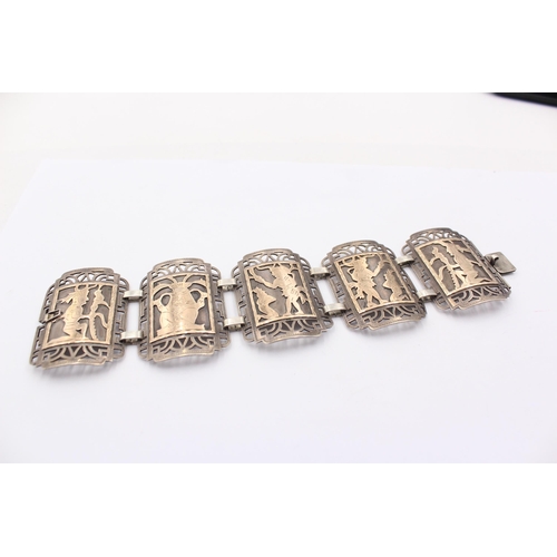 1161 - A Mexican .925 silver panel bracelet