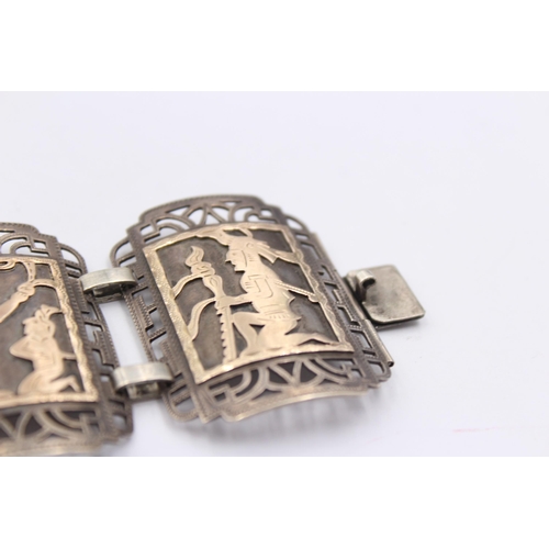 1161 - A Mexican .925 silver panel bracelet