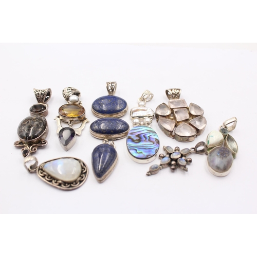 1163 - Eight .925 silver gemstone set pendants