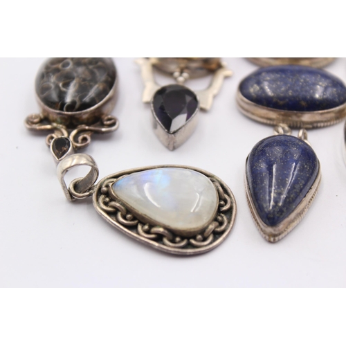 1163 - Eight .925 silver gemstone set pendants