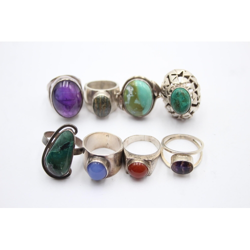 1169 - Eight .925 silver gemstone set rings