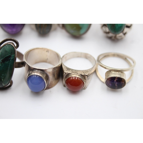 1169 - Eight .925 silver gemstone set rings