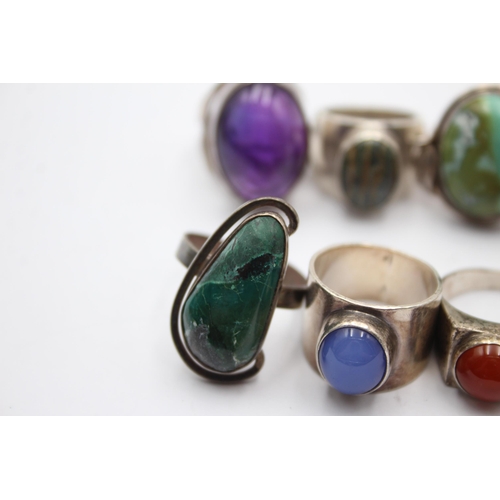 1169 - Eight .925 silver gemstone set rings