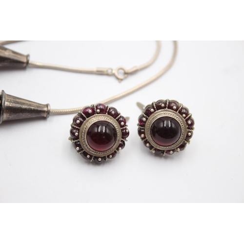 1179 - A .925 silver and garnet necklace and earrings set