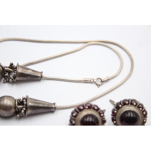 1179 - A .925 silver and garnet necklace and earrings set