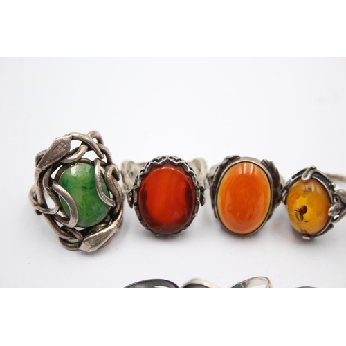 1182 - Eight .925 silver gemstone set rings to include amber etc.