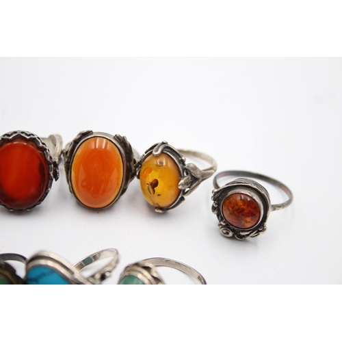 1182 - Eight .925 silver gemstone set rings to include amber etc.