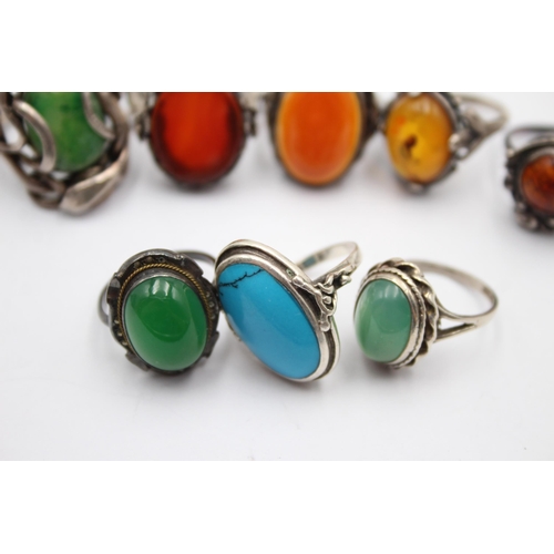 1182 - Eight .925 silver gemstone set rings to include amber etc.