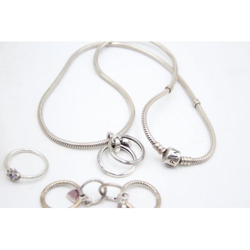 1185 - Six pieces of Pandora .925 silver jewellery