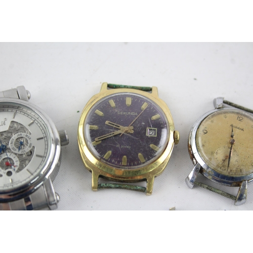 1299 - Five vintage mechanical and automatic men's wristwatch heads to include Rodania, Sekonda etc.