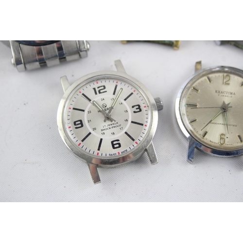 1299 - Five vintage mechanical and automatic men's wristwatch heads to include Rodania, Sekonda etc.