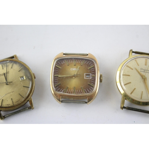 1312 - Four vintage mechanical and automatic men's wristwatch heads to include Tissot, Waltham etc.