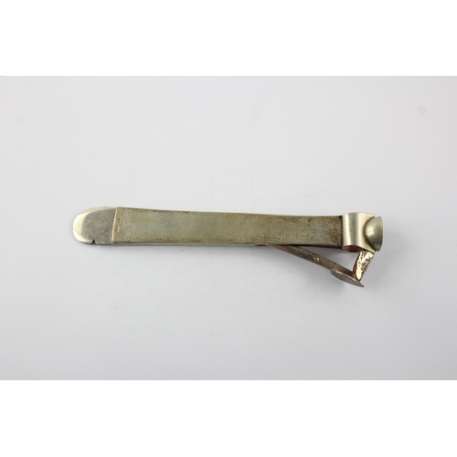 1325 - A stamped .830 silver hammered effect cigar cutter - approx. gross weight 113 grams and 17cm long