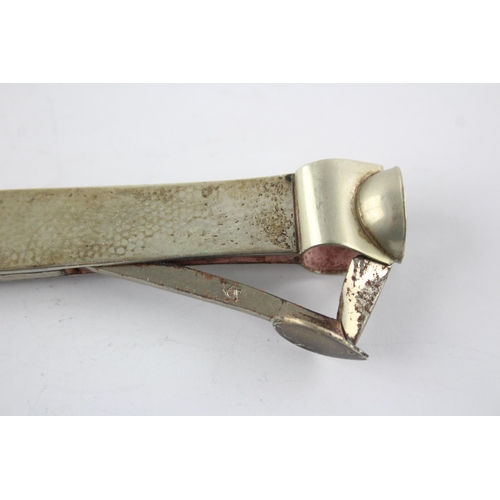 1325 - A stamped .830 silver hammered effect cigar cutter - approx. gross weight 113 grams and 17cm long