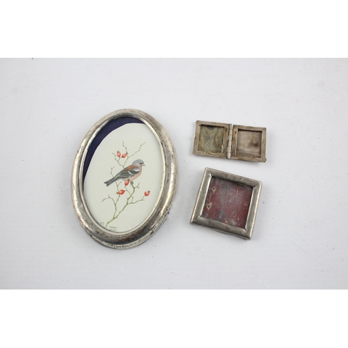 1327 - Three hallmarked sterling silver photo frames to include hand drawn artwork etc. - approx. gross wei... 