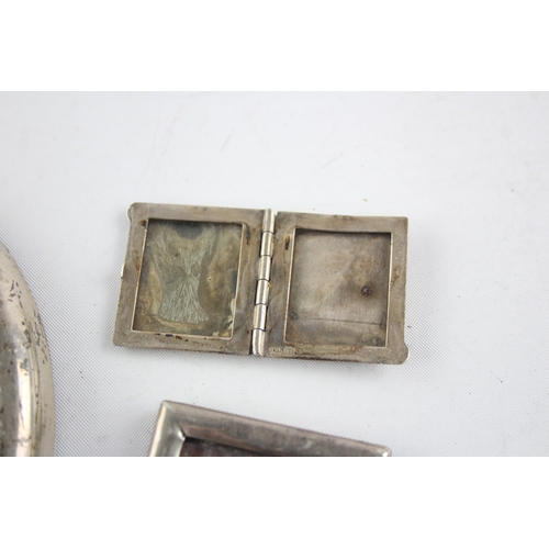 1327 - Three hallmarked sterling silver photo frames to include hand drawn artwork etc. - approx. gross wei... 