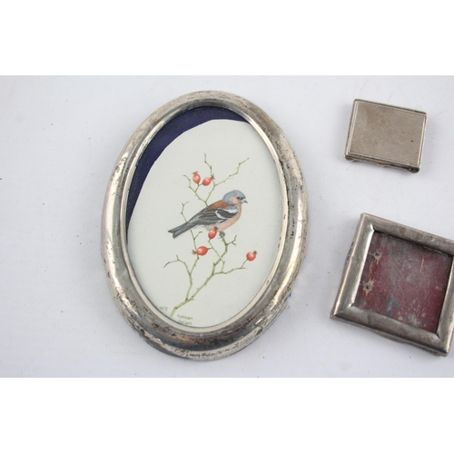 1327 - Three hallmarked sterling silver photo frames to include hand drawn artwork etc. - approx. gross wei... 