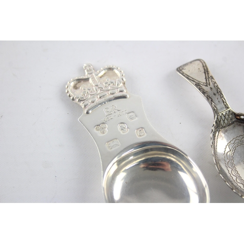 1329 - Two hallmarked sterling silver caddy spoons, one Elizabeth II Coronation and one Georgian - approx. ... 