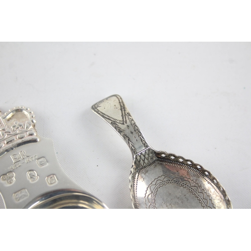 1329 - Two hallmarked sterling silver caddy spoons, one Elizabeth II Coronation and one Georgian - approx. ... 