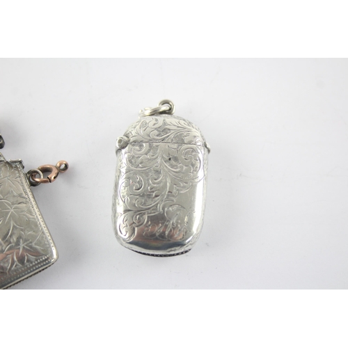 1345 - Two hallmarked sterling silver vesta cases - approx. gross weight 43 grams