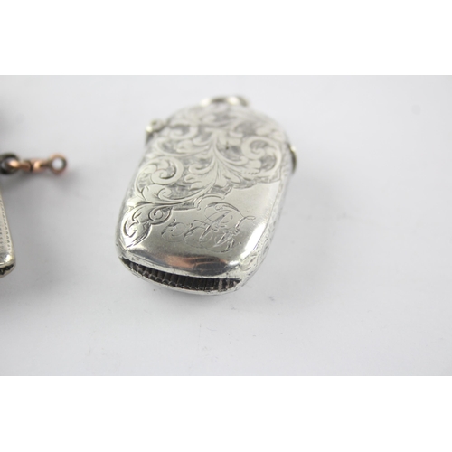 1345 - Two hallmarked sterling silver vesta cases - approx. gross weight 43 grams