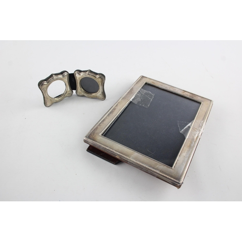 1369 - Two hallmarked sterling silver photo frames - approx. gross weight 580 grams