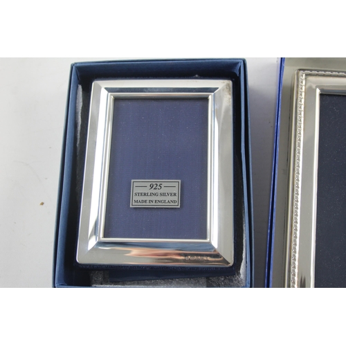 1371 - Two boxed hallmarked sterling silver photo frames - approx. gross weight 378 grams