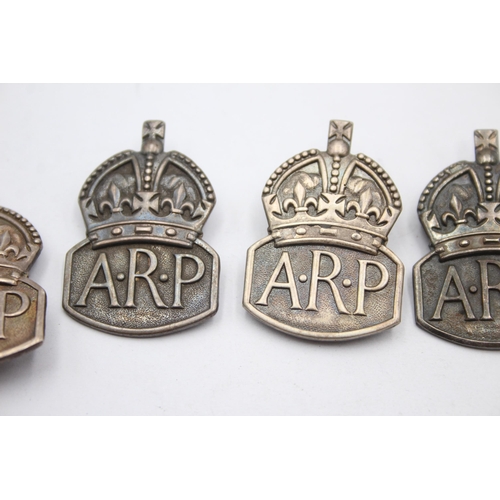 1384 - Five WWII A.R.P sterling silver badges - approx. gross weight 44 grams