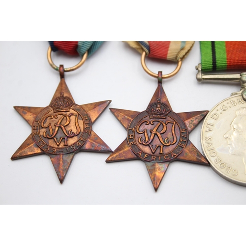 1385 - A WWII mounted medal group to include Africa Star with North Africa clasp etc.