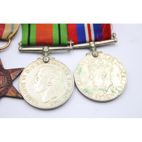 1385 - A WWII mounted medal group to include Africa Star with North Africa clasp etc.