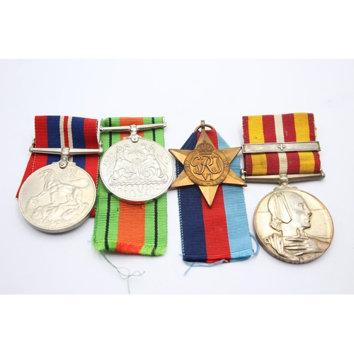 1395 - Four WWII medals to include Voluntary Medical Service medal presented to Mrs. Anne Forster etc.