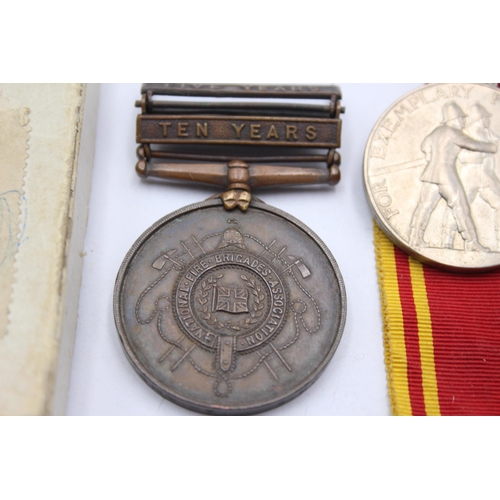 1398 - Two boxed Elizabeth II medals presented to Idris Williams, one National Fire Brigades Association br... 