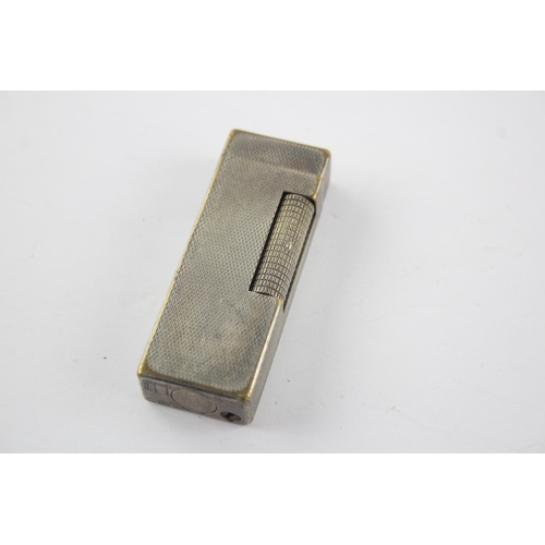 1412 - A Dunhill Rollagas silver plated cigarette lighter