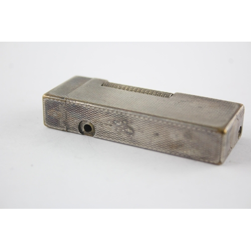 1412 - A Dunhill Rollagas silver plated cigarette lighter