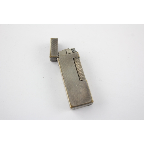 1412 - A Dunhill Rollagas silver plated cigarette lighter