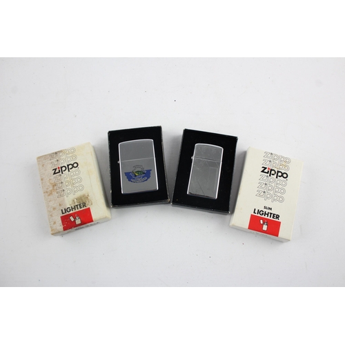 1418 - Two boxed Zippo cigarette lighters