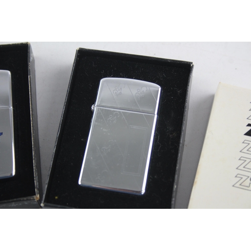 1418 - Two boxed Zippo cigarette lighters