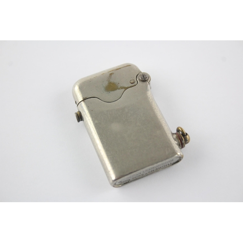 1424 - A 1930s Thorens Teleflam single claw petrol cigarette lighter