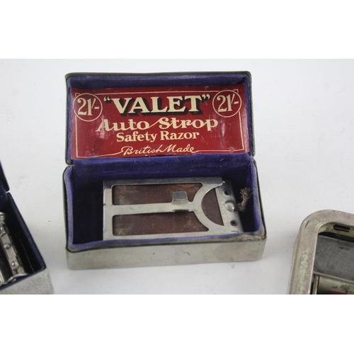 1428 - Four vintage gent's grooming razors and blades to include Gillette etc.