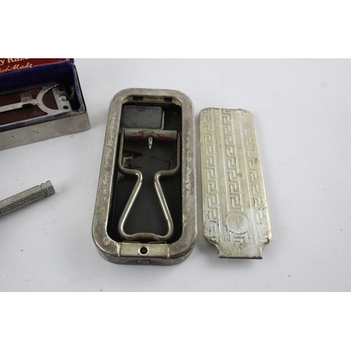 1428 - Four vintage gent's grooming razors and blades to include Gillette etc.